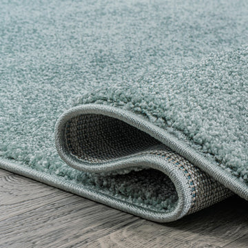 Haze Solid Low-pile Area Rug Light Blue